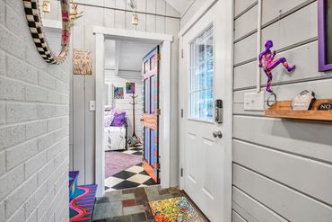 bright and colorful entryway in a cabin retreat available through airbnb and vrbo