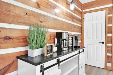 inviting coffee bar in a rustic cabin setting in a vacation rental with airbnb and vrbo
