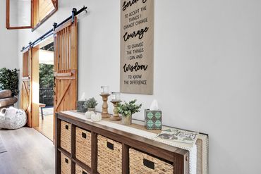 Welcoming storage cabinet and guest book in a vacation rental with airbnb and vrbo