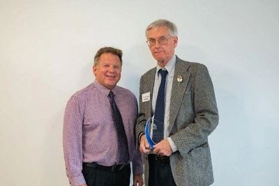 Leonard Skonecki poses with former Mayor of Fostoria Eric Keckler.