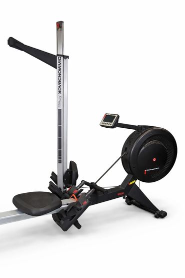 Black and silver rowing machine with digital monitor and foot straps.