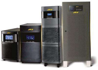 Four black and gray uninterruptible power supply (UPS) units of varying sizes.