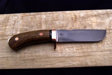 Custom forged knife with full tang and antler handle. Along with copper pins and guard.
