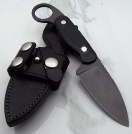 Custom forged knife with finger ring and parkerized finished. Custom sheath to closely fit the knife