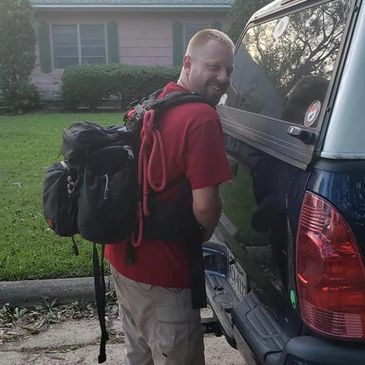 Founder David gearing up with his Mystery Ranch Gear to save the Goats from the Bayou water
