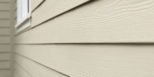 closeup picture of HardiePlank lap siding with Cedarmill finish