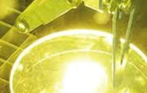 Laser ablation of diamond coated optical window