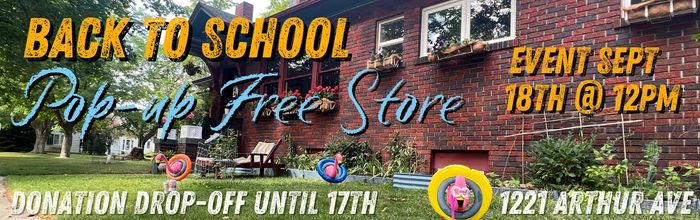 Website cover photo front of brick house with three flamingos with inner tubes