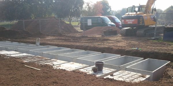 concrete graves being built.