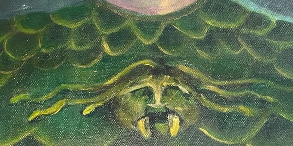 A mythical creature with fangs and flowing hair.