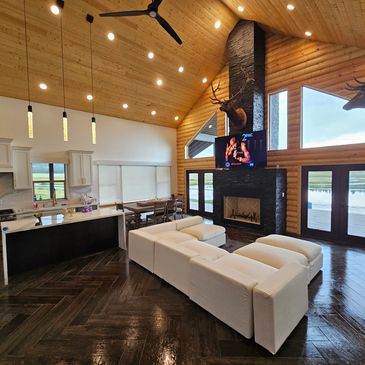 Herringbone tile design
custom stacked stone on fireplace wall
Ceiling Tongue & Groove installation