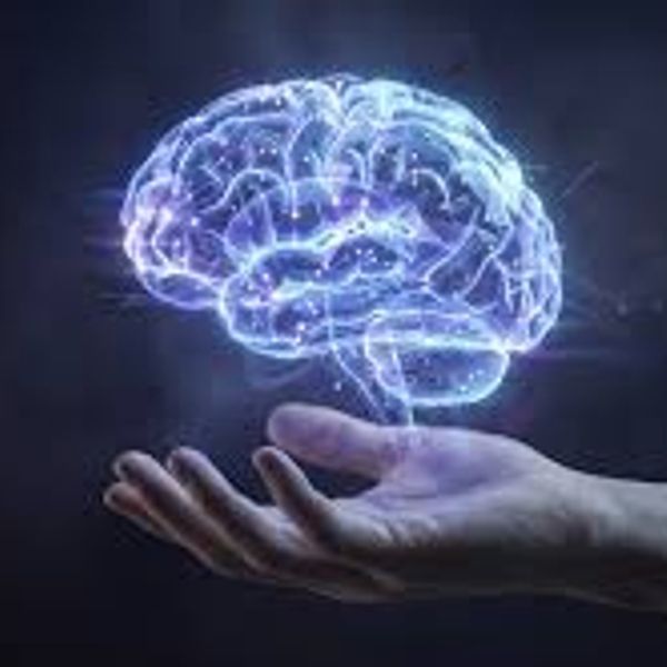 Hand holding glowing digital brain hologram.