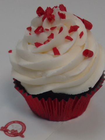 A rich and moist red velvet cupcake with cream cheese icing