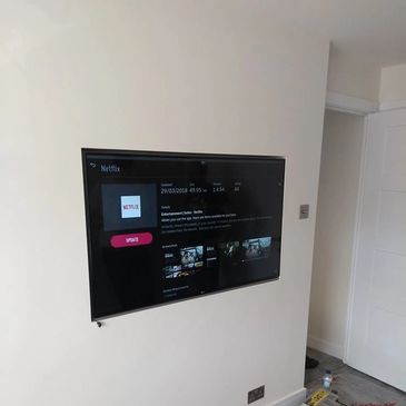 Flat screen wall mounting. TV wall mount. Recessed wall mounting.