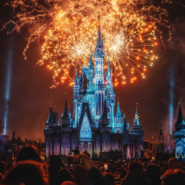 Photo of fireworks at Disney world castle. 