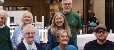 People smiling for the walk the mall event for meals on wheels
