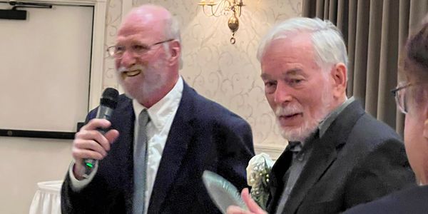 Valley Press Club President Peter Goonan, left, and award recipient Wayne Phaneuf.