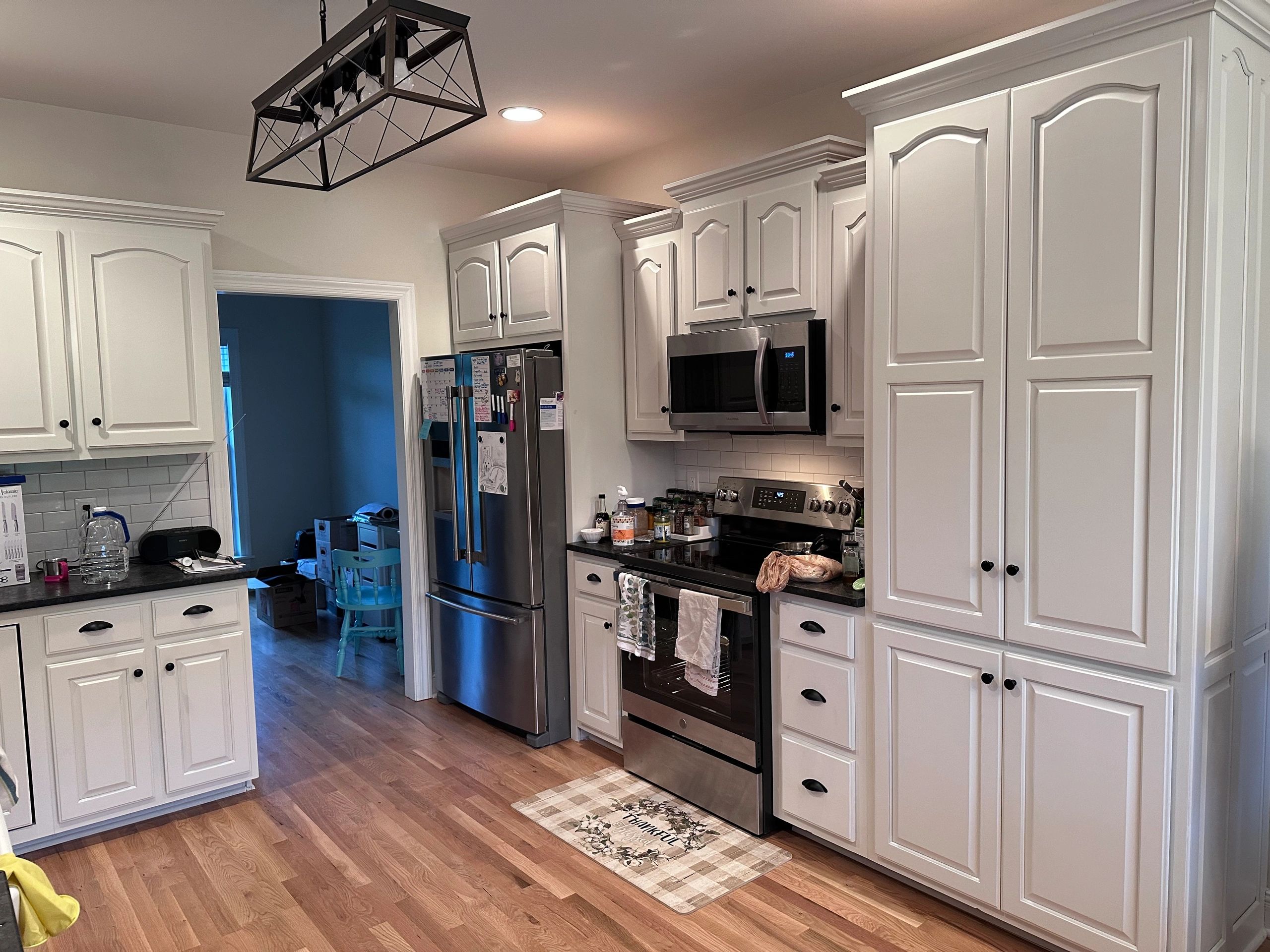 A nice set of cabinets that we refinished, added soft close hinges/glides and new hardware.