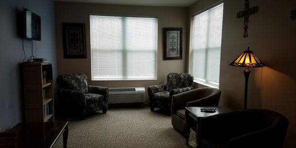 Sugar Valley Lodge has comfortable sitting areas for residents to watch television, read, and relax.
