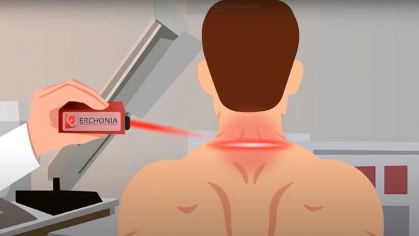 Cold laser therapy being applied to a patient at The Stretch Doc chiropractic clinic in Henderson NV