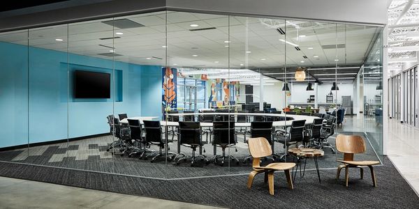 Interior of a office with two chairs and a table
