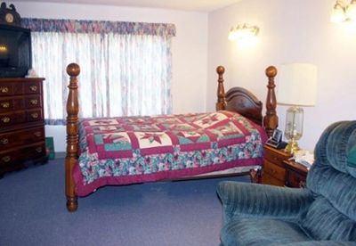 Resident room with bed and recliner