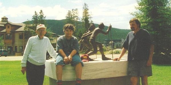 Olav Pedersen (honoree), Richard Dahl (Artist's son and helper) Bill Osmundsen, Artist and Founder for "Ski for Light - Art for Sight" Bronze on Marble Monument. 1998 Instillation and dedication, Frisco, Colorado