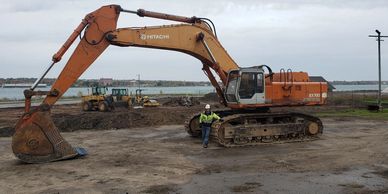 Burton Excavating, Inc. 49783 used equipment for sale site prep septic systems, water lines material