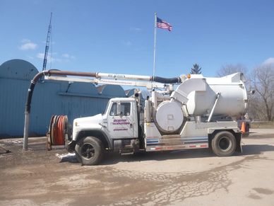 Burton Excavating, Inc. 49783 used equipment for sale site prep septic systems, water lines material