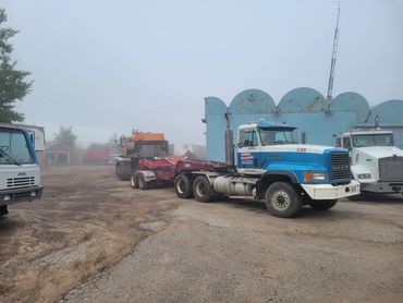 Burton Excavating, Inc - 49783 site prep, water/sewer/septic system, landscape materials