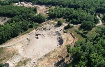 Burton Excavating Inc 49783 site prep, water/sewer/septic system, landscape materials 15 Mile Rd pit