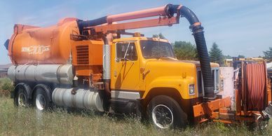 Burton Excavating, Inc. 49783 used equipment for sale site prep septic systems, water lines material