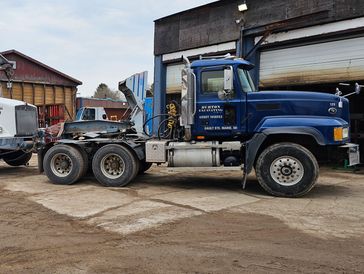 Burton Excavating, Inc - 49783 site prep, water/sewer/septic system, landscape materials.