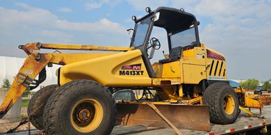 Burton Excavating, Inc. 49783 used equipment for sale site prep septic systems, water lines material