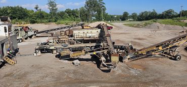 Burton Excavating Inc 49783 sand, stone, gravel site prep sewer repair crushing screening aggregate