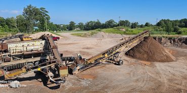 Burton Excavating Inc 49783 sand, stone, gravel site prep sewer repair crushing screening aggregate