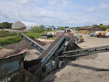 Burton Excavating Inc 49783 sand stone gravel site prep sewer repair land clearing hauling