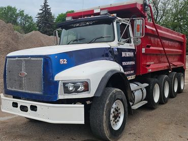 Burton Excavating, Inc - 49783 site prep, water/sewer/septic system, landscape materials. Dump Truck