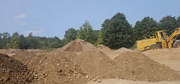 Burton Excavating, Inc. 49783 site prep aggregate material sewer work landscaping