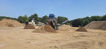 Burton Excavating, Inc. 49783 site prep aggregate material sewer work landscaping