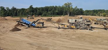 Burton Excavating, Inc. 49783 site prep aggregate material sewer work landscaping