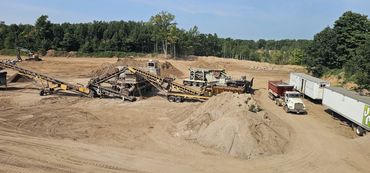 Burton Excavating, Inc. 49783 site prep aggregate material sewer work landscaping