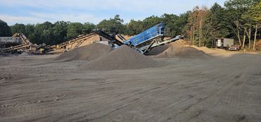 Burton Excavating, Inc. 49783 site prep aggregate material sewer work landscaping