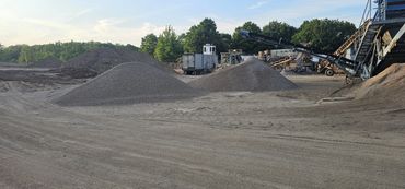 Burton Excavating, Inc. 49783 site prep aggregate material sewer work landscaping
