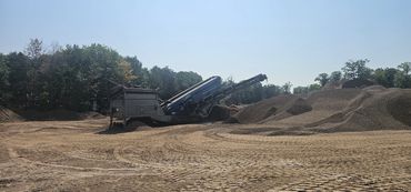 Burton Excavating Inc 49783 sand stone gravel site prep sewer repair land clearing waste removal