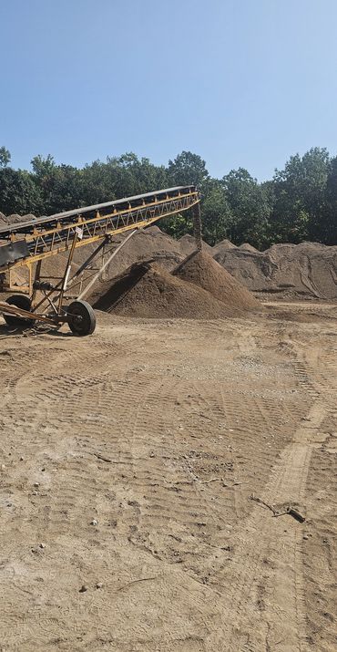 Burton Excavating Inc 49783 sand stone gravel site prep sewer repair land clearing waste removal