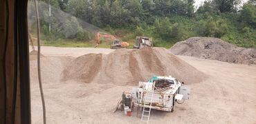 Burton Excavating Inc 49783 sand, stone, gravel site prep sewer repair crushing screening aggregate