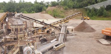 Burton Excavating Inc 49783 sand, stone, gravel site prep sewer repair crushing screening aggregate