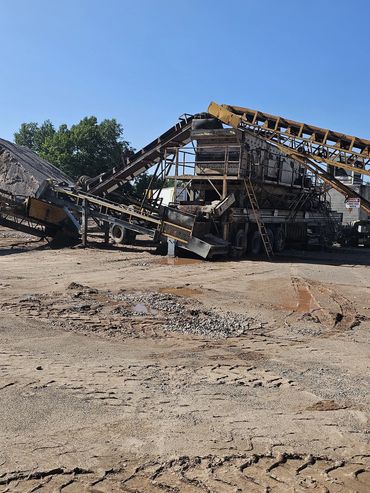 Burton Excavating Inc 49783 sand, stone, gravel site prep sewer repair crushing screening aggregate