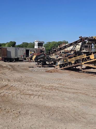 Burton Excavating Inc 49783 sand, stone, gravel site prep sewer repair crushing screening aggregate